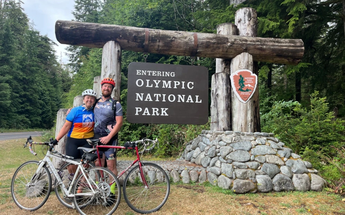 Alumni Kaylyn Messenger with fiance Nick Proctor riding the Olympic Peninsula Bike Tour together.