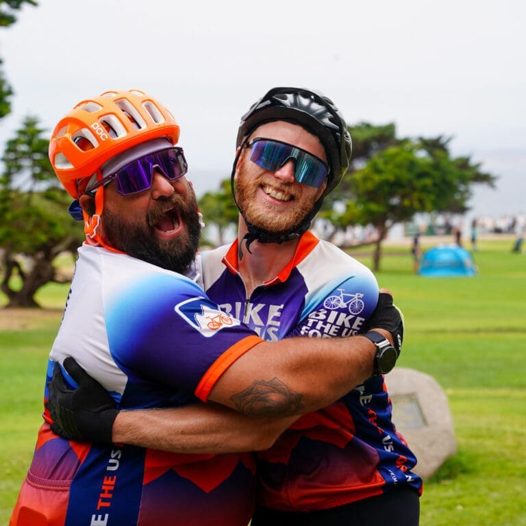 Bike the US for MS riders hugging