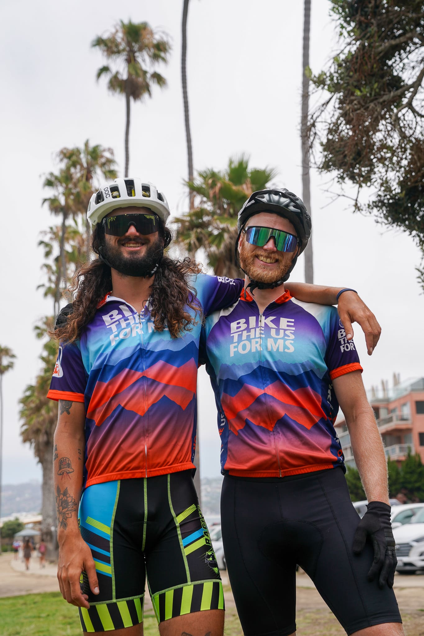 Pacific Coast riders arm in arm