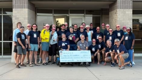 Team check donation to Hope for MS Foundation in Pittsburg, KA